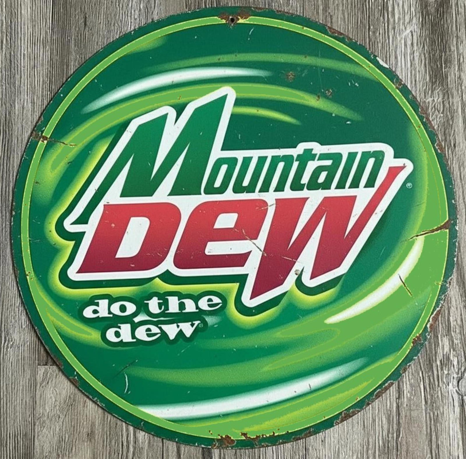 Mountain Dew 12" Diameter Vintage Novelty Metal Sign Made In USA